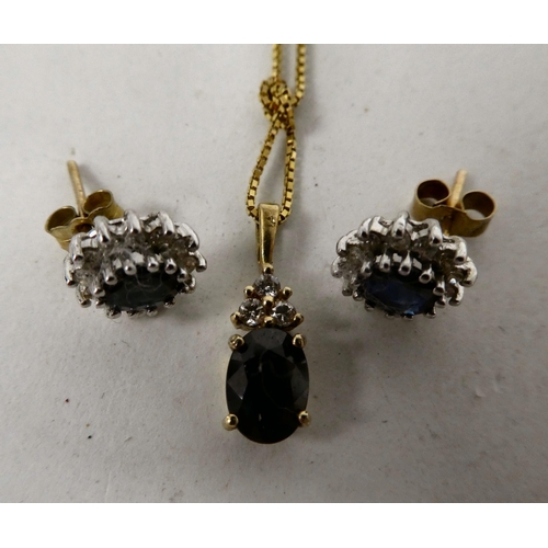 75 - 9ct gold jewellery, set with sapphires and diamonds, viz. a pendant necklace and a pair of earrings