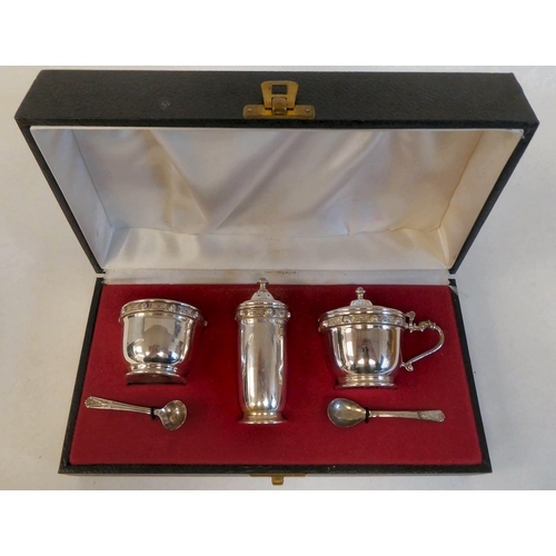 97 - A three piece silver condiments set  Dublin 1976  cased