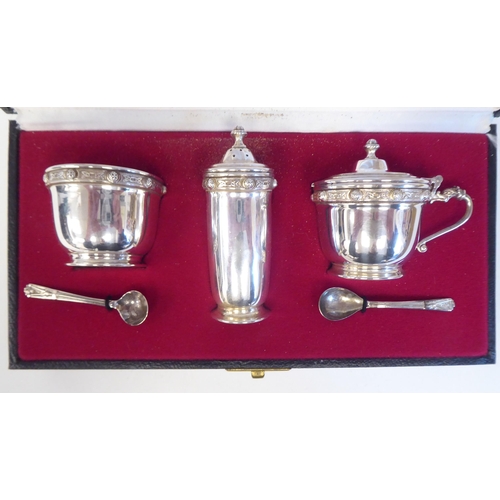 97 - A three piece silver condiments set  Dublin 1976  cased