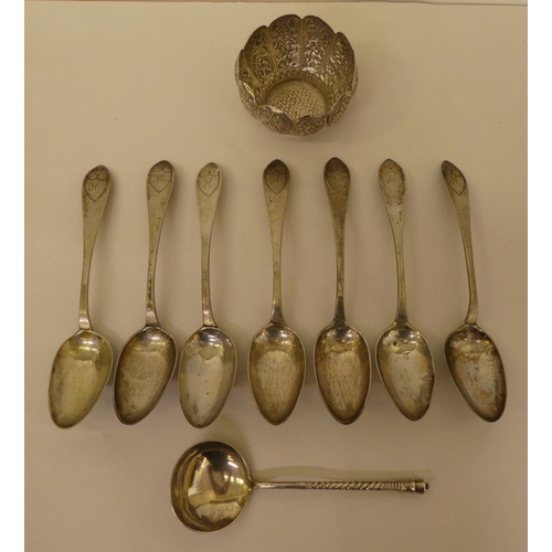 349 - White metal flatware; and an Indian style bowl  4