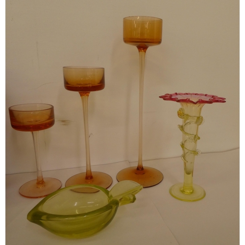 355 - 20thC art glass: to include a brandy balloon tea light holder; and a candlestick  SIZE