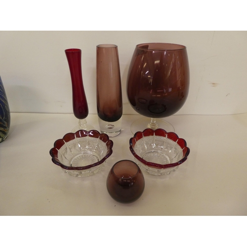 355 - 20thC art glass: to include a brandy balloon tea light holder; and a candlestick  SIZE