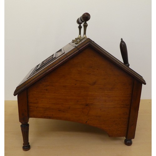 98 - An Edwardian mahogany purdonium of angular form with brass mounts and a carved, panelled, hinged lid... 