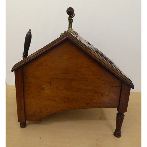 98 - An Edwardian mahogany purdonium of angular form with brass mounts and a carved, panelled, hinged lid... 