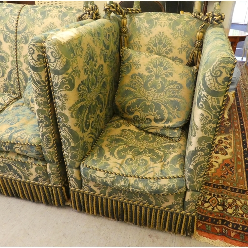 16 - A modern Liberty green and beige floral fabric upholstered drop-end settee; and a pair of matching c... 