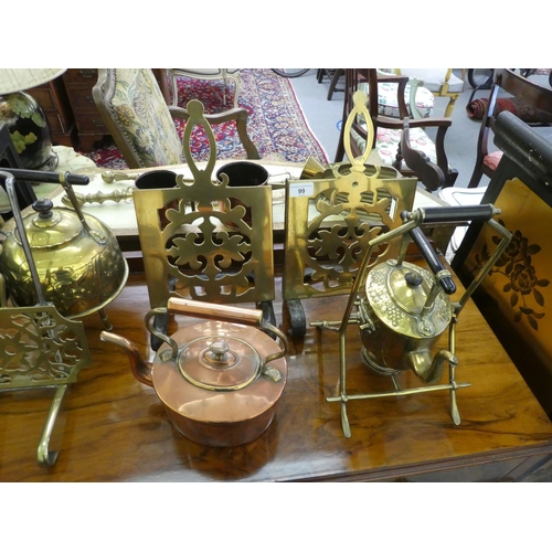 99 - Victorian and later functional metalware: to include fireside stands; companions; mugs; and kettles