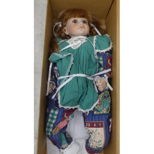 103 - Four individually named Lloyd Middleton, Royal Vienna collector's dolls  largest 16