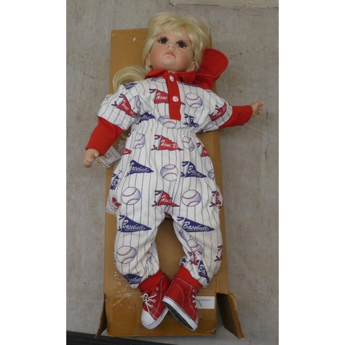 103 - Four individually named Lloyd Middleton, Royal Vienna collector's dolls  largest 16