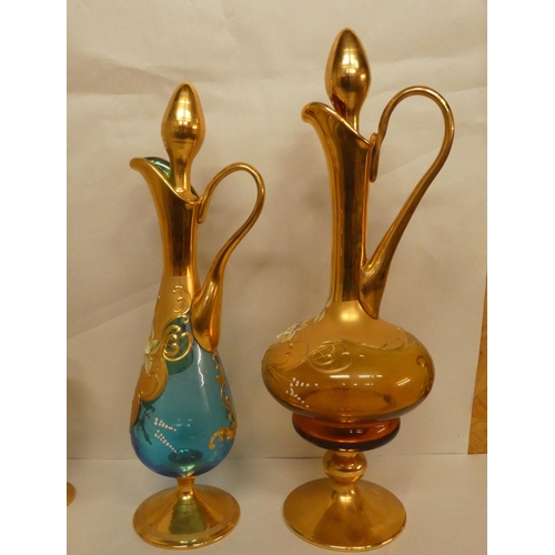 112 - Two Murano glass liqueur sets, each with a ewer  15