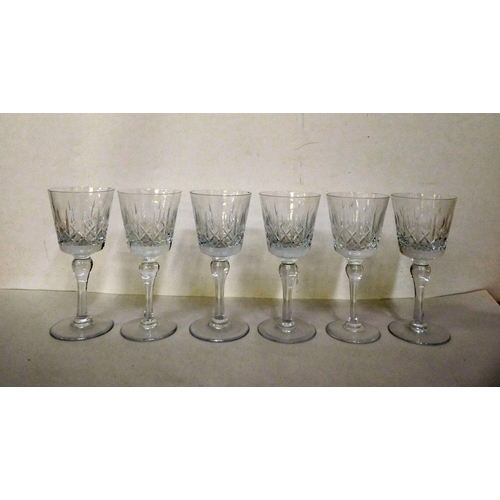 133 - Glassware: to include a set of eight Stuart Crystal pedestal wine glasses, etched with fruiting vine