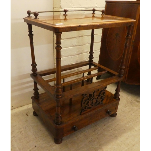 14 - A late Victorian walnut side table/Canterbury, over a base drawer, on turned feet  31