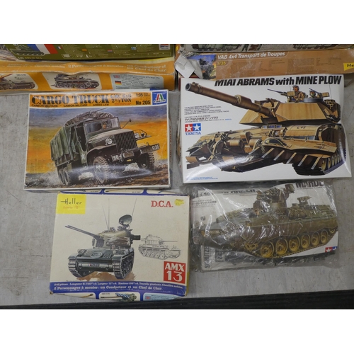 154 - 1/35 scale model kits: to include by Tamiya a 'M4A3 Sherman'; and a 'White M3A1 Scout Car' by Airfix... 