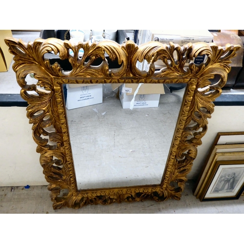 167 - A modern Rococo design, gilt painted, wood framed mirror  40