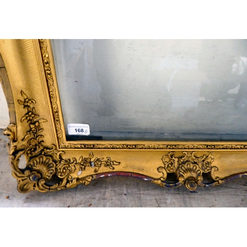 168 - A late Victorian gilded gesso picture frame of ornate pierced design  the aperture  22