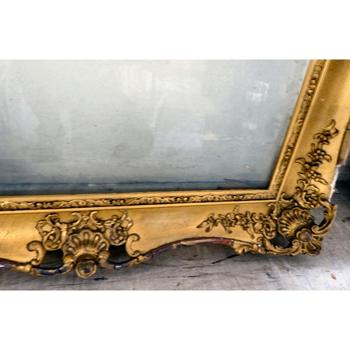 168 - A late Victorian gilded gesso picture frame of ornate pierced design  the aperture  22