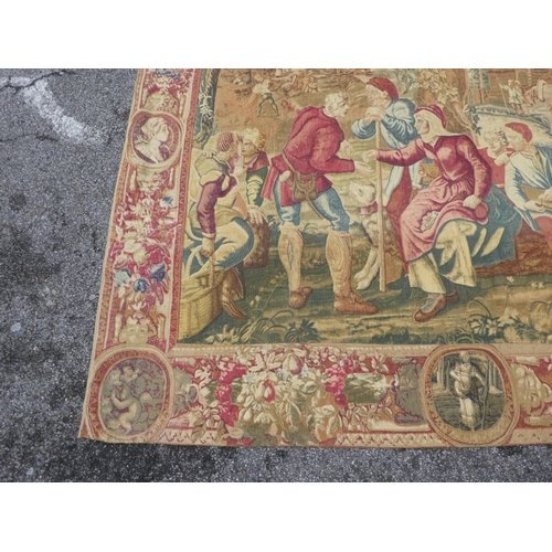 172 - A 20thC Belgian tapestry, depicting figures in a courtyard setting  77