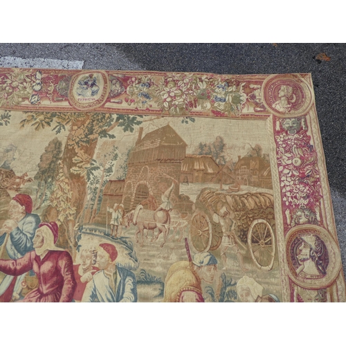 172 - A 20thC Belgian tapestry, depicting figures in a courtyard setting  77