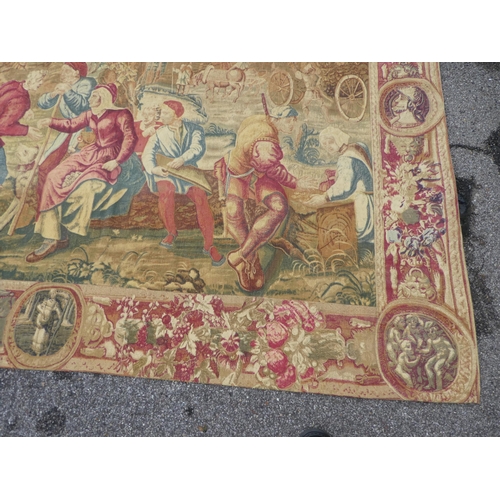 172 - A 20thC Belgian tapestry, depicting figures in a courtyard setting  77