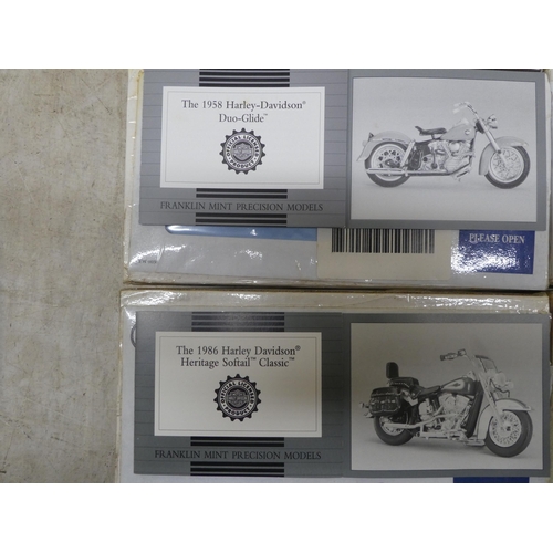 173 - Six Franklin Mint diecast model motorcycles: to include 'The 1907 Harley Davidson'; and a '1976 Harl... 