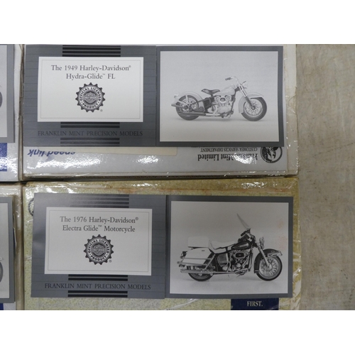 173 - Six Franklin Mint diecast model motorcycles: to include 'The 1907 Harley Davidson'; and a '1976 Harl... 