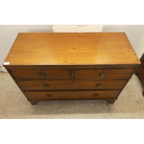 2 - A George III and later adapted, four drawer dressing chest, raised on bracket feet  29