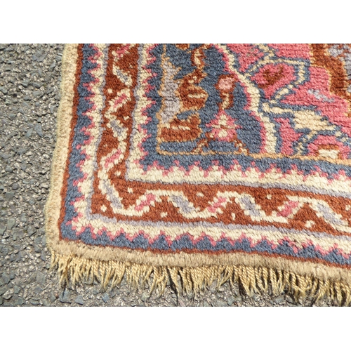 205 - A prayer rug, on a red ground  20