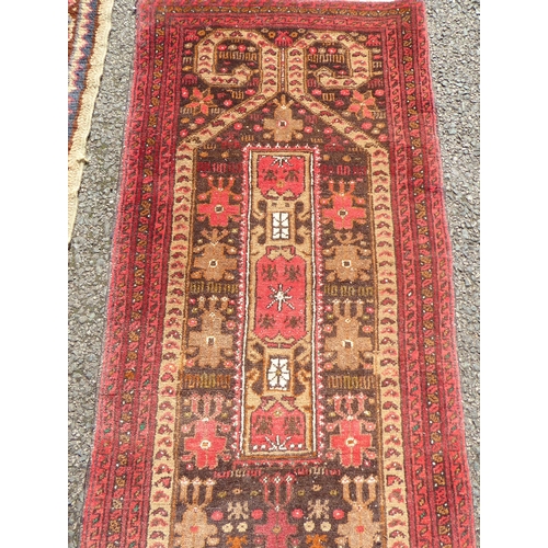 205 - A prayer rug, on a red ground  20