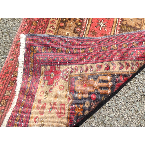 205 - A prayer rug, on a red ground  20