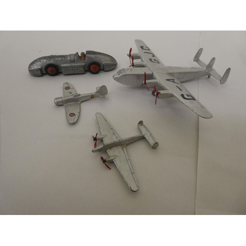 213 - Three Dinky diecast model aeroplanes and a car; and a Chinese made tinplate clockwork 'Rescue-Helico... 