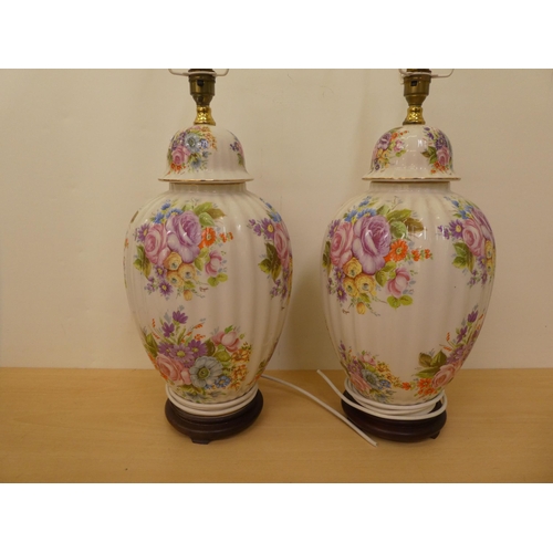 227 - A pair of modern china table lamps, each decorated with floral sprigs  17