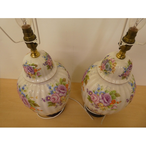 227 - A pair of modern china table lamps, each decorated with floral sprigs  17