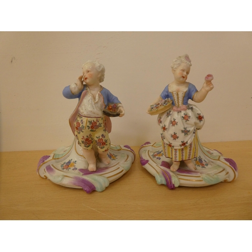 257 - Ceramics: to include a pair of late 19thC Meissen porcelain stands, each surmounted by a figure ... 