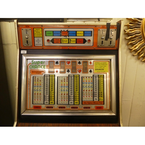 258 - Vintage rosewood effect, laminated and steel bound, cased electronic operated fruit machine by JPM M... 