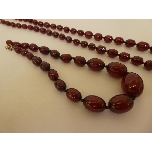 274 - Cherry coloured amber bead necklaces 178 grams