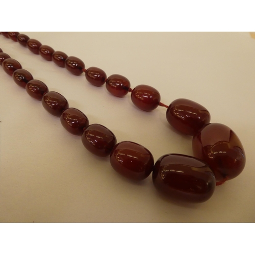 274 - Cherry coloured amber bead necklaces 178 grams