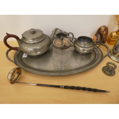 276 - Metalware: to include a George III white metal toddy ladle, on a whalebone handle 