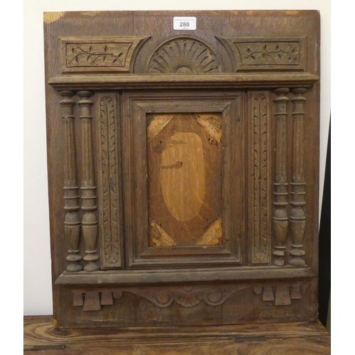 280 - Wooden collectables: to include a late 19thC carved oak furniture panel  19