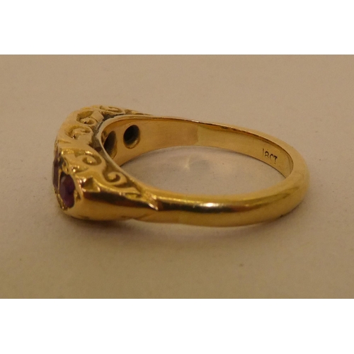 291 - A 18ct gold ruby and diamond ring