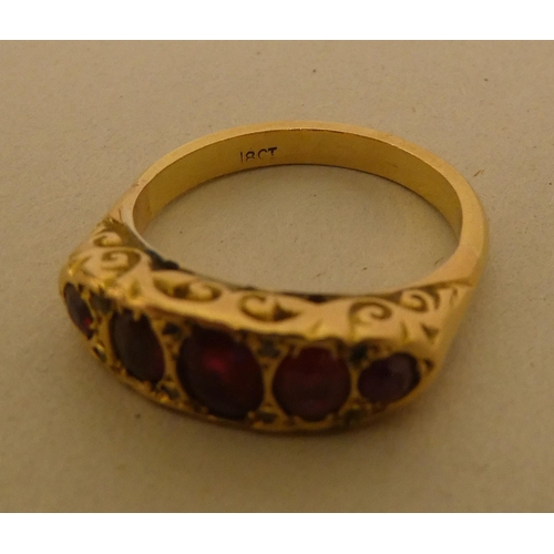 291 - A 18ct gold ruby and diamond ring