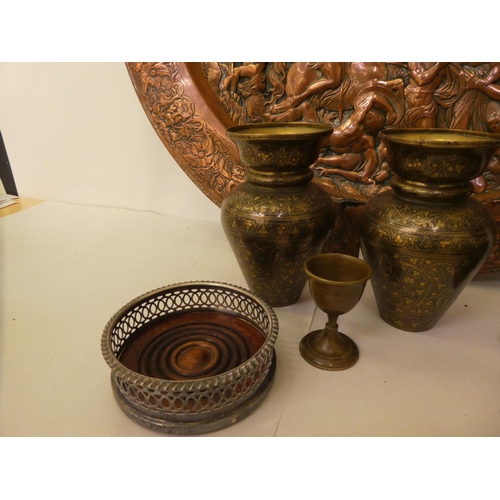 309 - Early 20thC functional metalware: to include a pressed copper charger  27