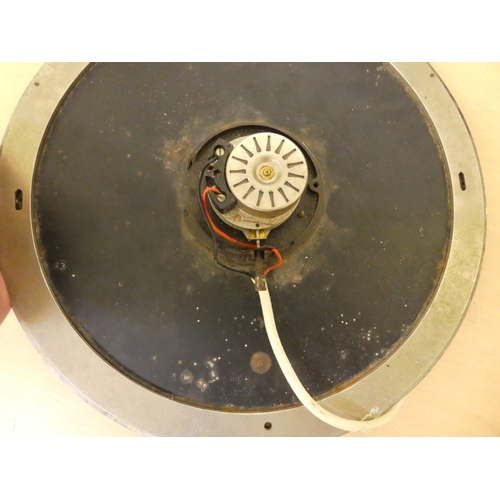 316 - Clocks: to include a cast metal Synclock electric example, faced by a Roman dial  13