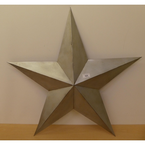 322 - A silver plated metal barn star  30