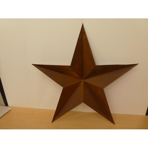 322 - A silver plated metal barn star  30