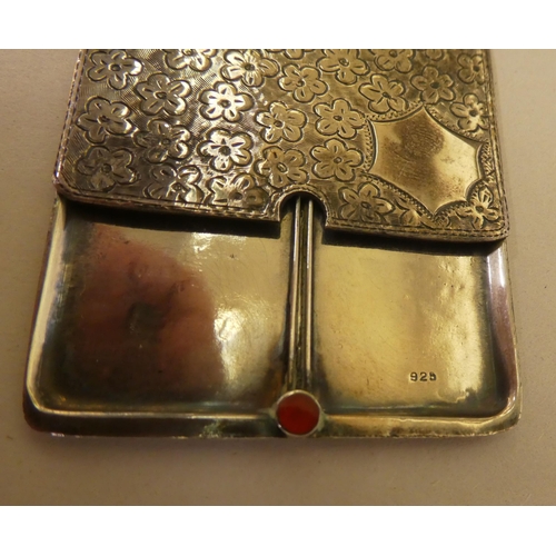 328 - A silver double stamp case with an engraved sliding top 