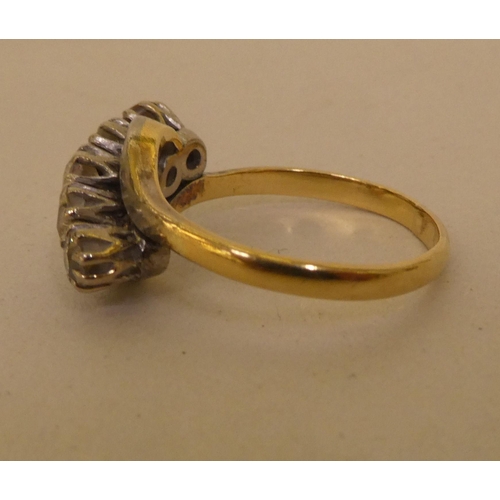 329 - An 18ct gold five stone diamond ring 