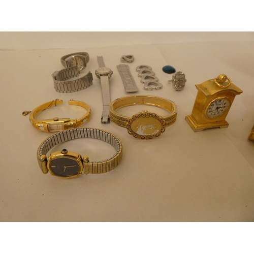 338 - Variously strapped and cased wristwatches