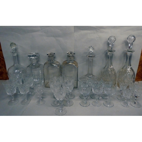 35 - Glassware: to include a pair of mid 19thC decanters and stoppers of shouldered box design  9.5