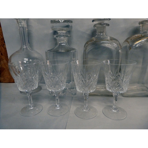 35 - Glassware: to include a pair of mid 19thC decanters and stoppers of shouldered box design  9.5