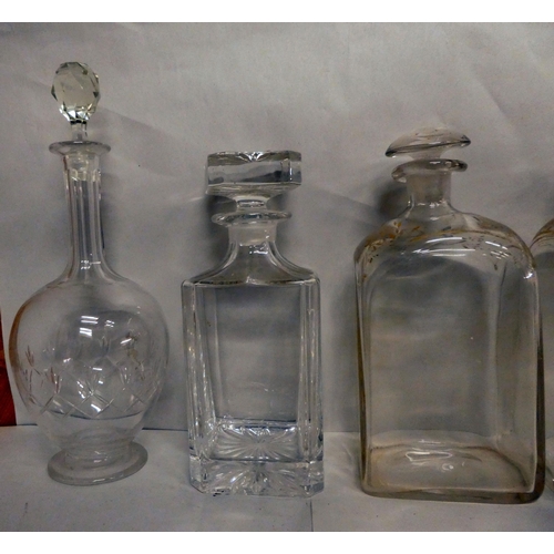 35 - Glassware: to include a pair of mid 19thC decanters and stoppers of shouldered box design  9.5