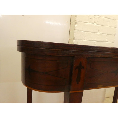 4 - A late Victorian mahogany D-end tea table, the foldover top raised on square, tapered legs  29.... 